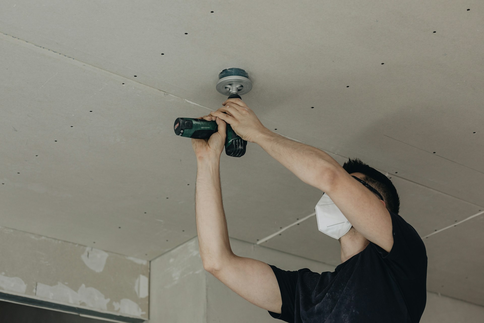 electrician fixing light